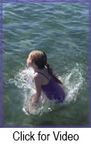 Make a splash - girl jumping in water
